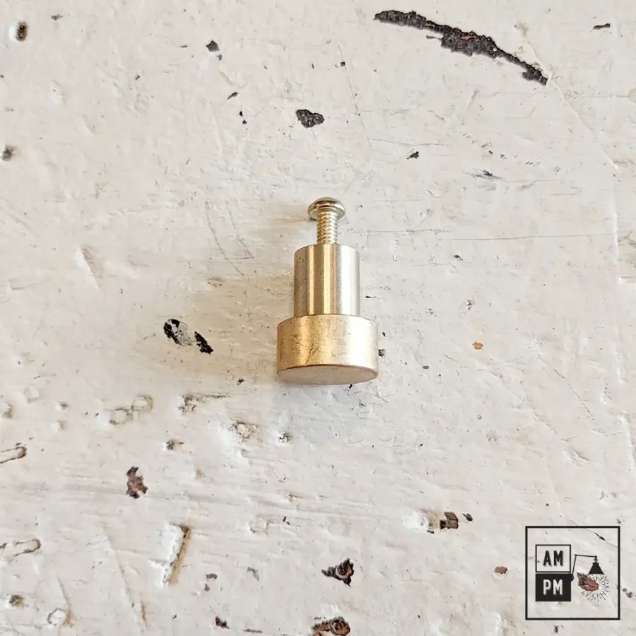 Mid-century-minimalist-kitchen-cabinet-small-knob-Raw-Brass